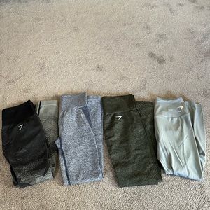 FOUR PAIRS OF GYMSHARK LEGGINGS. Size small